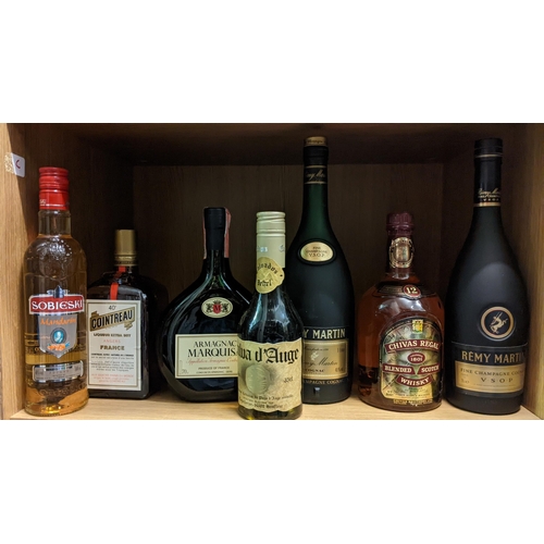 280 - Collection of spirits to include: Sobieski, Calva d'Auge, Cointreau, Armagnac Marquisa, Remy Martin,... 