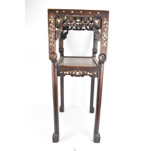 84 - A Chinese late Qing dynasty padouk wood two tier table, having a rectangular top inset with marble, ... 