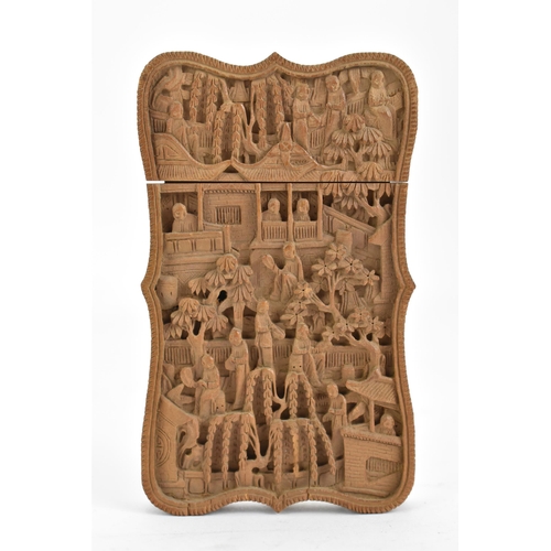 88 - A Chinese late Qing dynasty Canton sandalwood carved card case, late 19th century, profusely carved ... 