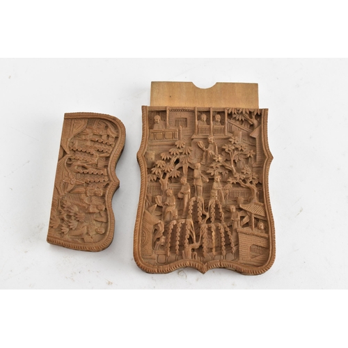 88 - A Chinese late Qing dynasty Canton sandalwood carved card case, late 19th century, profusely carved ... 