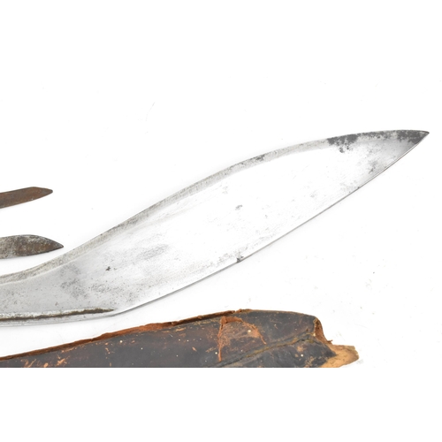 90 - A WWII Darjeeling Nepalese/Indian kukri, having a treen handle and complete with leather sheath and ... 