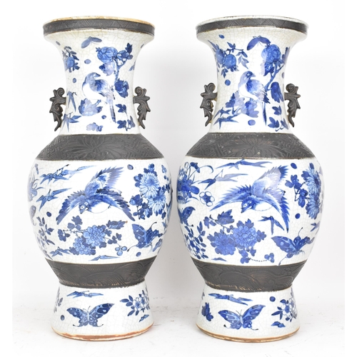 99 - A pair of Chinese late Qing dynasty nanking crackle glazed blue and white vases, late 19th century, ... 