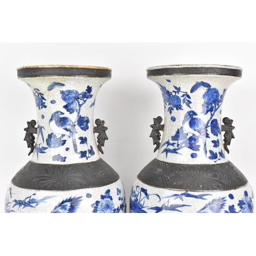 99 - A pair of Chinese late Qing dynasty nanking crackle glazed blue and white vases, late 19th century, ... 