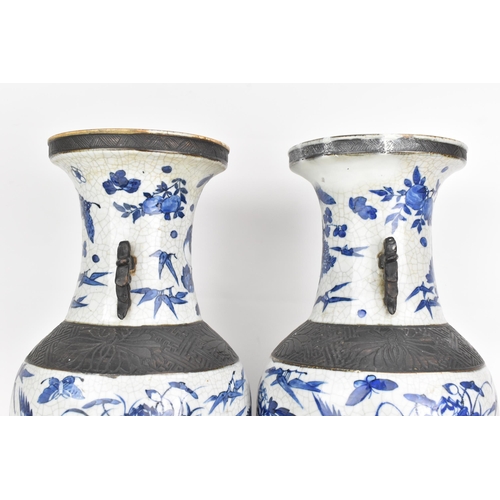 99 - A pair of Chinese late Qing dynasty nanking crackle glazed blue and white vases, late 19th century, ... 