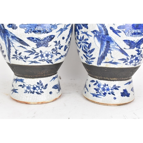 99 - A pair of Chinese late Qing dynasty nanking crackle glazed blue and white vases, late 19th century, ... 