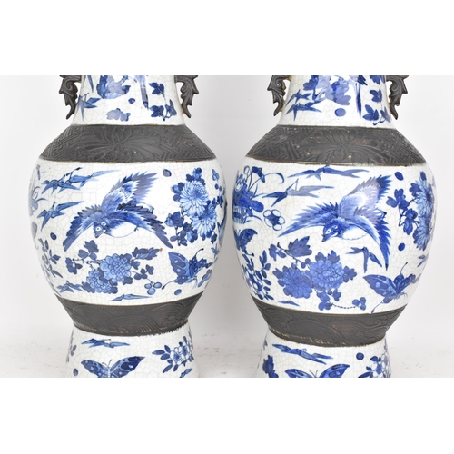 99 - A pair of Chinese late Qing dynasty nanking crackle glazed blue and white vases, late 19th century, ... 