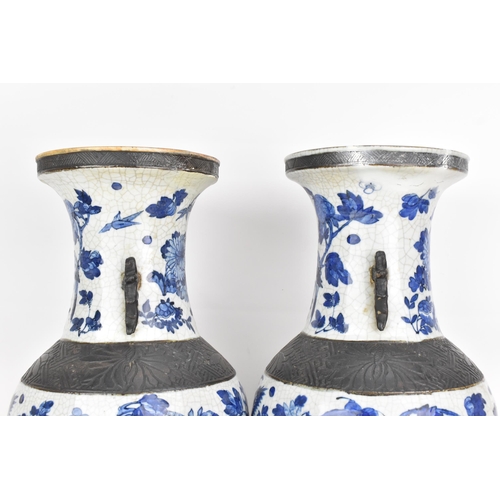 99 - A pair of Chinese late Qing dynasty nanking crackle glazed blue and white vases, late 19th century, ... 