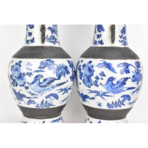 99 - A pair of Chinese late Qing dynasty nanking crackle glazed blue and white vases, late 19th century, ... 