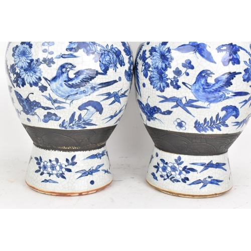 99 - A pair of Chinese late Qing dynasty nanking crackle glazed blue and white vases, late 19th century, ... 