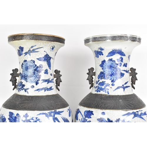 99 - A pair of Chinese late Qing dynasty nanking crackle glazed blue and white vases, late 19th century, ... 