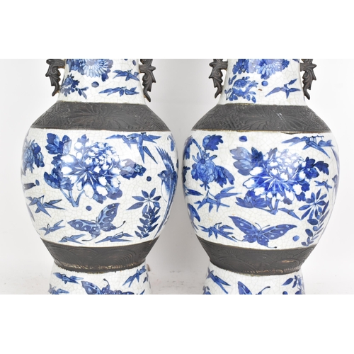 99 - A pair of Chinese late Qing dynasty nanking crackle glazed blue and white vases, late 19th century, ... 