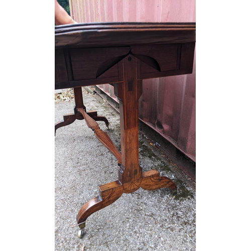 146 - A Regency mahogany sofa table, having a crossbanded rectangular top and two fall flaps, two frieze d... 