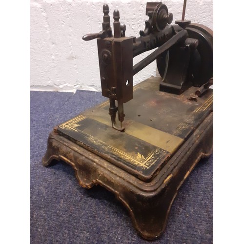 53 - A Victorian Howe lockstitch sewing machine A/F with geometric and floral design together with a blon... 