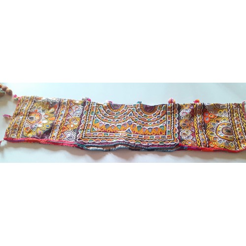 84 - A quantity of Banjara mirrored and embroidered bags, a traditional and elaborately embroidered India... 