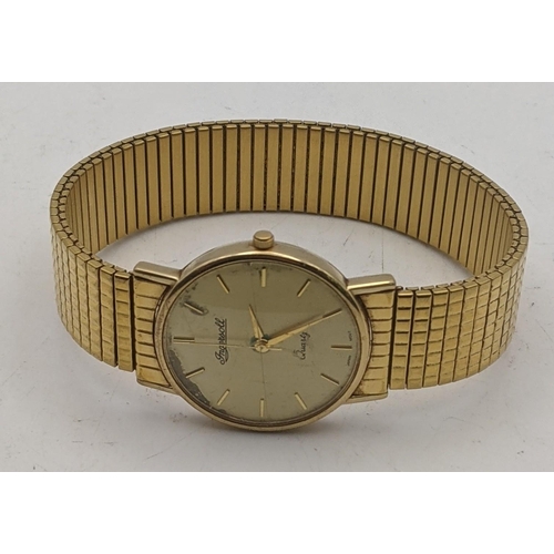 37 - A 9ct gold gents Ingersoll wristwatch on a gold plated expanding bracelet, total weight 41g
Location... 