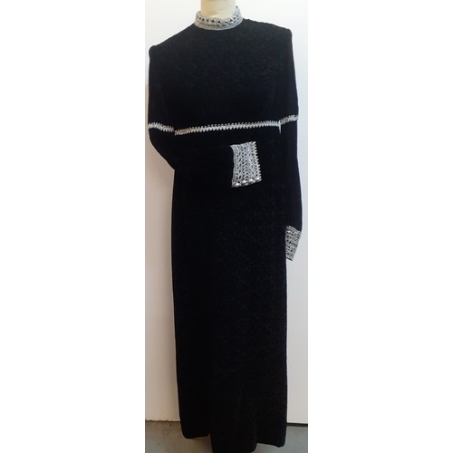 51 - Jean Varon, British Designer- A 1960's black full length plush velvet gown with silver metallic embr... 