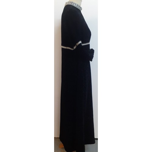 51 - Jean Varon, British Designer- A 1960's black full length plush velvet gown with silver metallic embr... 