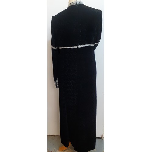 51 - Jean Varon, British Designer- A 1960's black full length plush velvet gown with silver metallic embr... 