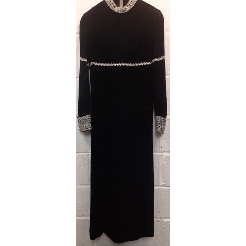 51 - Jean Varon, British Designer- A 1960's black full length plush velvet gown with silver metallic embr... 