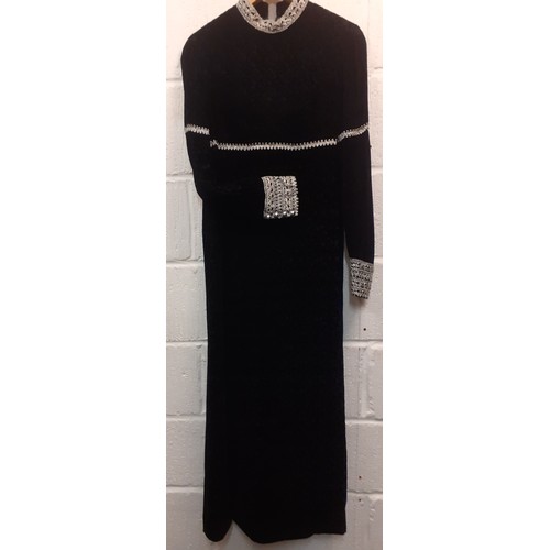 51 - Jean Varon, British Designer- A 1960's black full length plush velvet gown with silver metallic embr... 