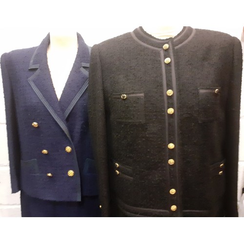 23 - Aquascutum- A navy boucle 2 piece skirt suit having a 6 gold button front double breast fastening wi... 