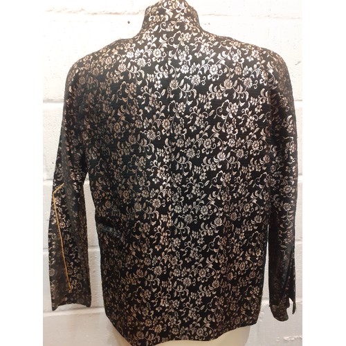 87 - A 1960's Japanese hand made ladies black box jacket with Mandarin collar, fabric knot button front f... 