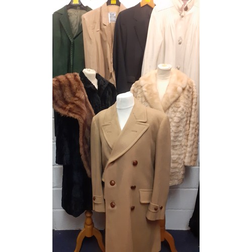 91 - A quantity of mixed vintage coats and clothing to include an FRG International gents silk suit appro... 