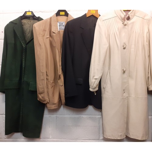 91 - A quantity of mixed vintage coats and clothing to include an FRG International gents silk suit appro... 