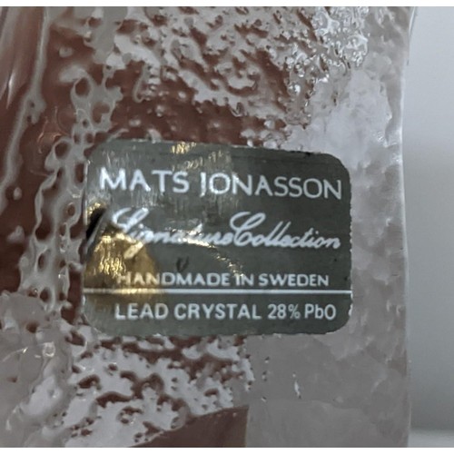 95 - A Mats Jonasson Signature Collection Swedish glass paperweight, decorated with two ducklings, signed... 