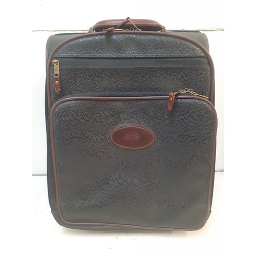 Mulberry-A black Scotchgrain wheelie cabin bag, approx 17" high x 13" wide x 9.5" deep. Location: BWR
If there is no condition report, please request.