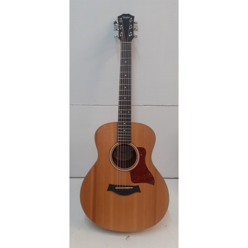 133 - A Taylor GSmini 6-string acoustic guitar with branded padded case, accessories and spare strings, se... 