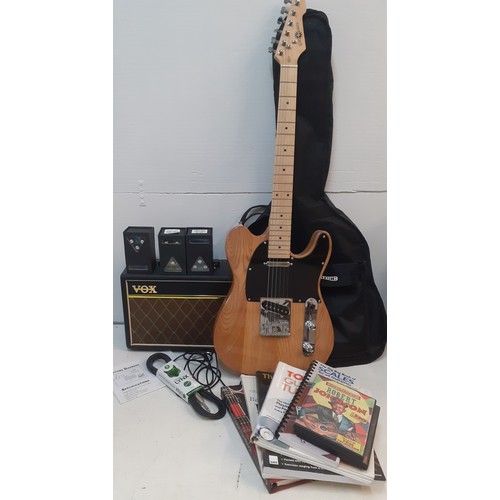 135 - A Gears4Music electric guitar with accessories and branded soft case together with a Vox amplifier, ... 