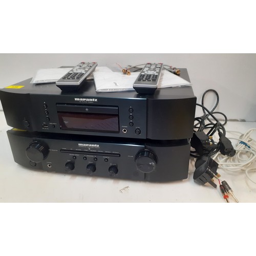 136 - A Marantz integrated amplifier PM6007 with remote, cables and instruction manual together with a Mar... 