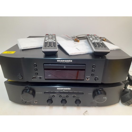 136 - A Marantz integrated amplifier PM6007 with remote, cables and instruction manual together with a Mar... 