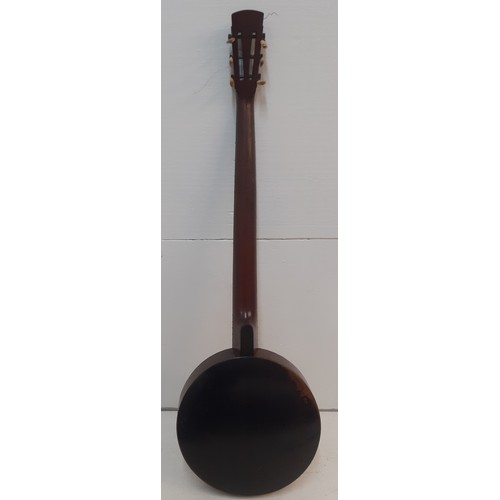 140 - A late 19th Century banjo A/F having mother of pearl inlay and a black wooden case. Location:RWF 
Co... 