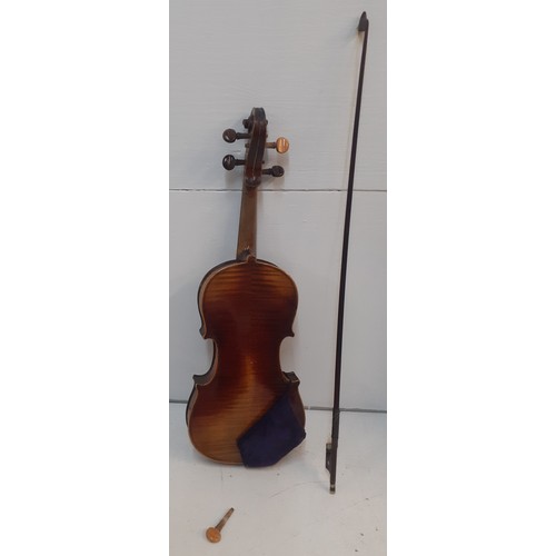 141 - A late 19th/early 20th Century violin A/F with bow A/F and black wooden case, no makers label to int... 