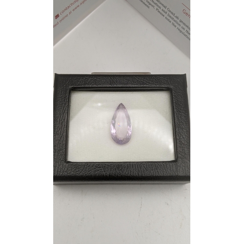 113 - A 14ct pear faceted cut amethyst 24.40mm x 11.98mm x 7.98mm together with a AIG certificate of authe... 