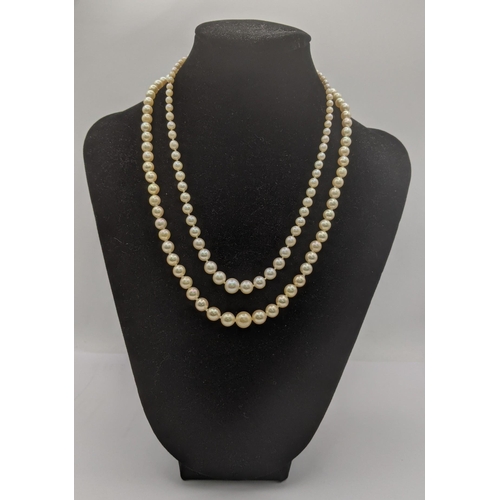 116 - Two pearl necklaces to include one example having a 9ct white gold clasp, along with one other havin... 