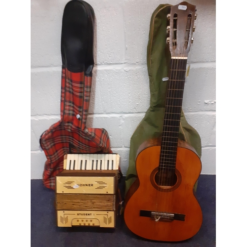 129 - A Valencian Tatay guitar , a 1970's 'punk scene' tartan guitar slip case, a green slip case and a Ho... 