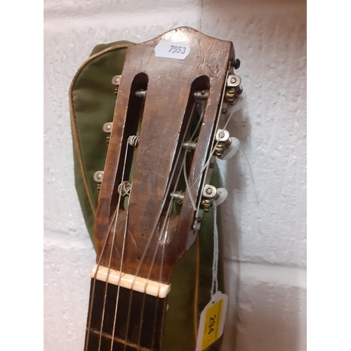 129 - A Valencian Tatay guitar , a 1970's 'punk scene' tartan guitar slip case, a green slip case and a Ho... 