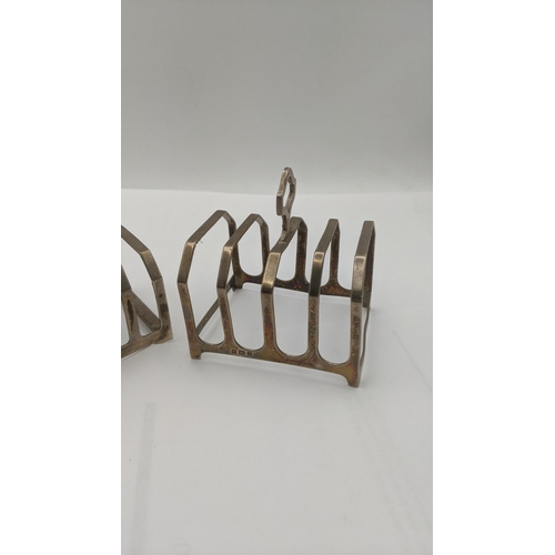 64 - Two silver toast racks to include one example made by Charles William Fletcher and sons hallmarked 1... 