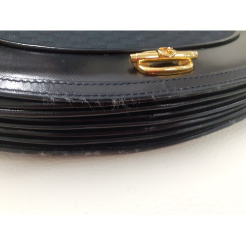 4 - Gucci-A vintage black leather shoulder bag approx 29cm wide x 23cm high having a double GG monogram ... 