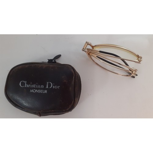 20 - Christian Dior- A pair of Monsieur vintage gentleman's prescription gold tone and folding eyeglass f... 