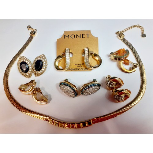 24 - Burberry, Grosse and Monet- A quantity of late 20th Century gold tone fashion jewellery to include a... 