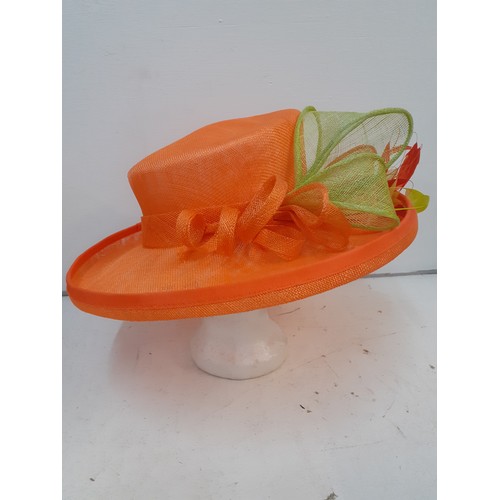 85 - A group of 5 ladies formal straw hats and 4 hatboxes to include a Gina Bacconi orange straw hat with... 