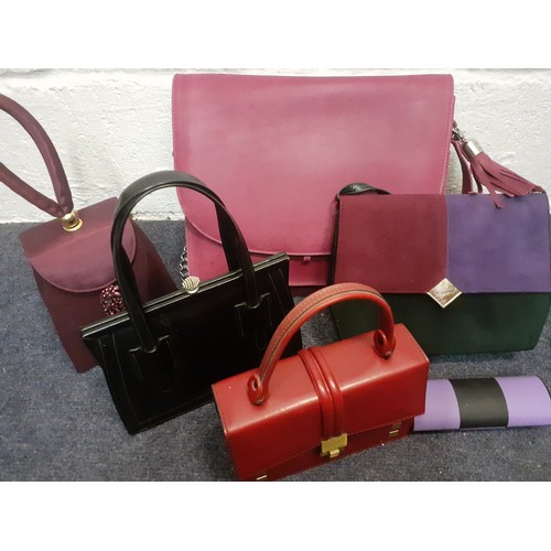 157 - A quantity of vintage bags to include a Taurus plum leather shoulder bag. Location: R2.5
If there is... 