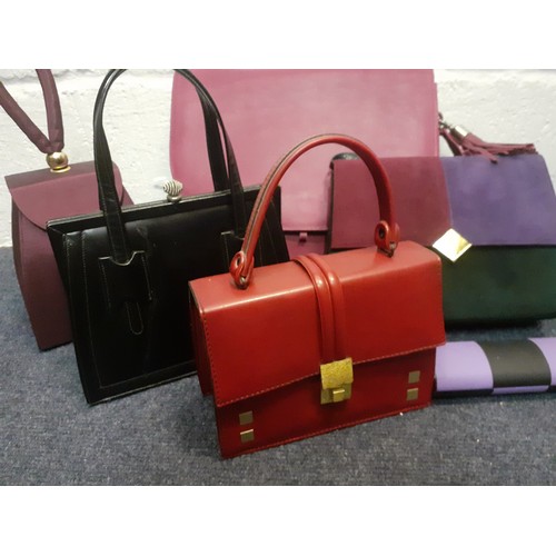 157 - A quantity of vintage bags to include a Taurus plum leather shoulder bag. Location: R2.5
If there is... 