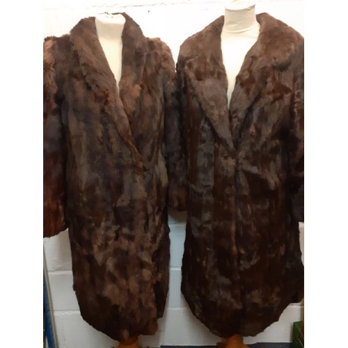 104 - Four vintage coats comprising a National Fur Company brown ermine coat approx 38