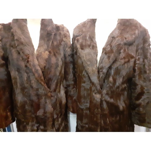 104 - Four vintage coats comprising a National Fur Company brown ermine coat approx 38