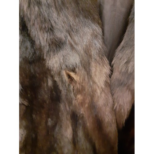 104 - Four vintage coats comprising a National Fur Company brown ermine coat approx 38